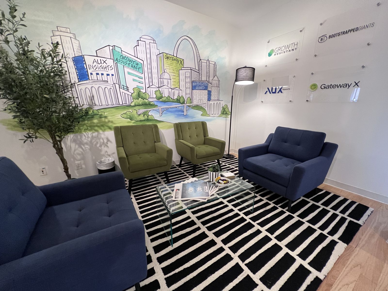 The Central West End office lounge with the hand-drawn St. Louis skyline mural